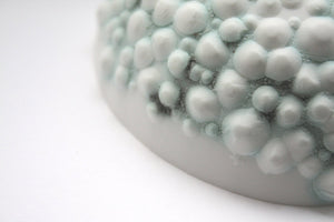 Stoneware bowl from English fine bone china with a unique textured surface and a hint of green
