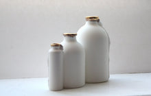 Load image into Gallery viewer, Trio of English fine bone china bottles with gold rims