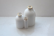 Load image into Gallery viewer, Trio of English fine bone china bottles with gold rims