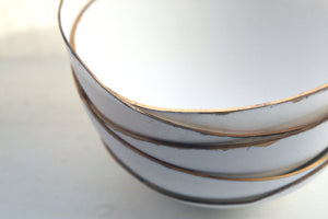 English fine bone china stoneware bowl with mat gold rims.