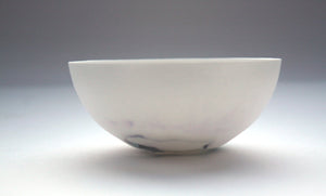 Small decorative bowl. Decorative stoneware fine bone china small bowl with green and purple hue.