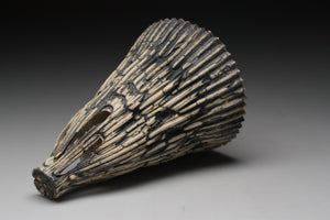 Abstract ceramic sculpture with unique shape and texture