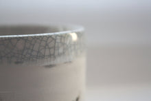Load image into Gallery viewer, Earthenware vessel handthrown with an aged look and embossed branches and bird cage