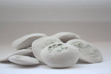 Load image into Gallery viewer, Stoneware Royal porcelain pebble with an imprint of a birdcage