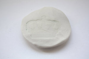 Stoneware Royal porcelain pebble with an imprint of a Royal crown