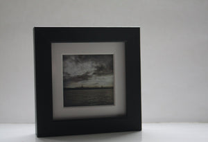 Landscape miniature photography - cloudy day by the sea