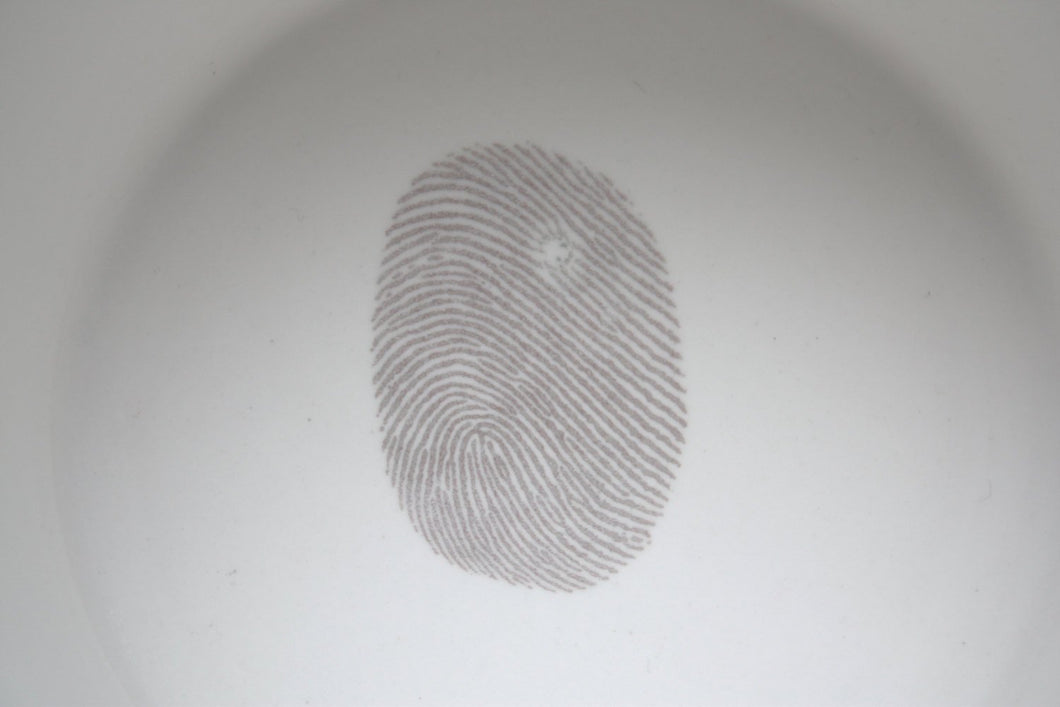 Stoneware fine bone china container or tealight holder with a grey fingerprint. Illustrated ceramics