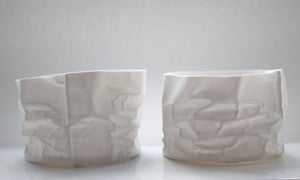 Crumpled paper looking white vessel made out of English fine bone china