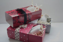Load image into Gallery viewer, Red gift box matchbox style with black floral pattern and ribbon