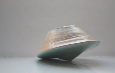 Small ceramic vessel in turquoise and toasted effect in unusual shape
