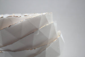 Geometric faceted polyhedron white bowl made from fine bone china with real gold finish in 4 sizes