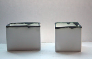 Pure white cube set made from fine bone china and burnt effect rims - geometric decor