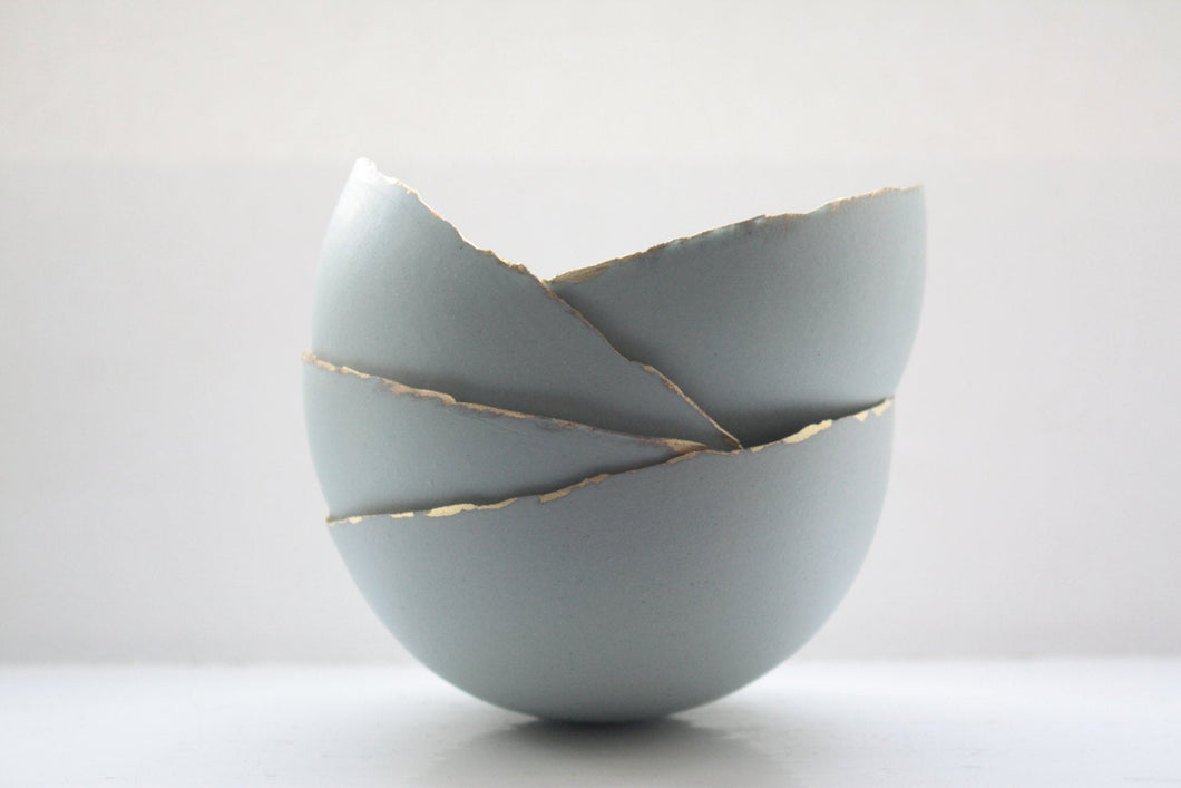 Large Blue porcelain bowl. Stoneware porcelain bowl in duck egg blue with gold rims.