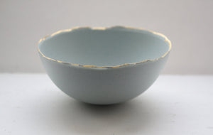 Blue porcelain bowl. Stoneware porcelain bowl in duck egg blue with gold rims.