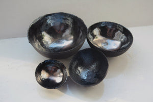 Limited Edition set of 4 chocolate black earthenware nesting bowls & metal graphite glaze interior.