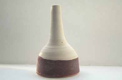 Abstract chunky small earthenware ceramic bottle with red glaze, hand thrown