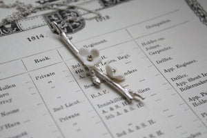 Solid silver long drop pendant with porcelain flowers - cherry blossom branch - silver twig pendant