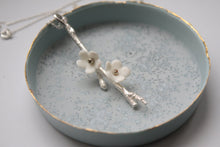 Load image into Gallery viewer, Solid silver long drop pendant with porcelain flowers - cherry blossom branch - silver twig pendant