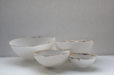 Set of 4 English fine bone china nesting stoneware bowls with real gold.